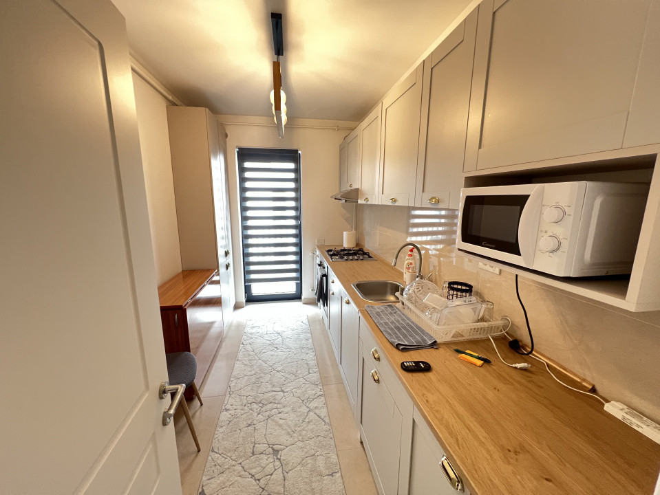Apartament-2 camere-decomandat-mobilat-utilat-etaj 1-parcare-2 balcoane