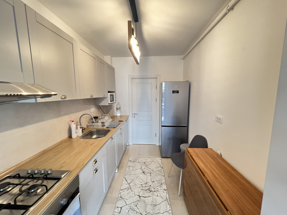 Apartament-2 camere-decomandat-mobilat-utilat-etaj 1-parcare-2 balcoane