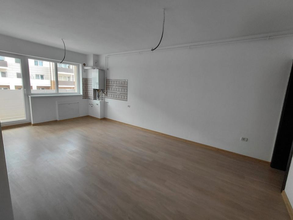 Apartament-2 camere-Studio-50mp-Utili-Etaj 1-Parcare-Balcon-Sanpetru