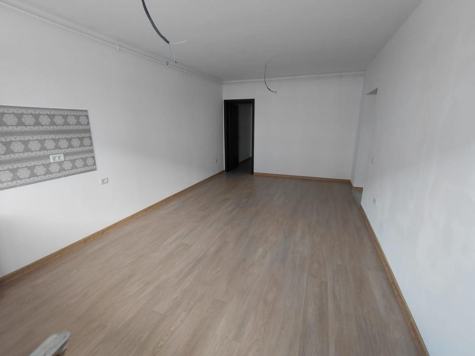 Apartament-2 camere-Studio-50mp-Utili-Etaj 1-Parcare-Balcon-Sanpetru
