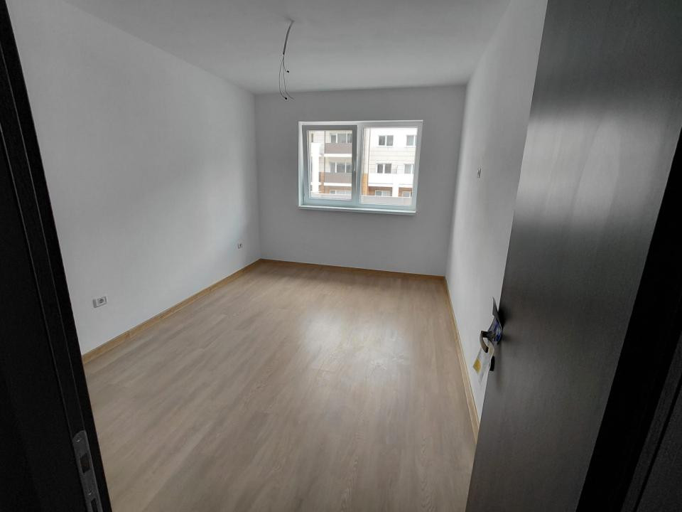 Apartament-2 camere-Studio-50mp-Utili-Etaj 1-Parcare-Balcon-Sanpetru