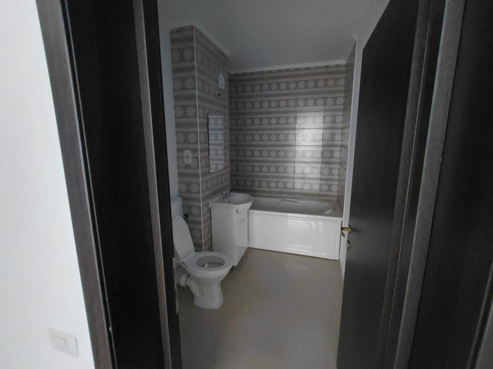 Apartament-2 camere-Studio-50mp-Utili-Etaj 1-Parcare-Balcon-Sanpetru