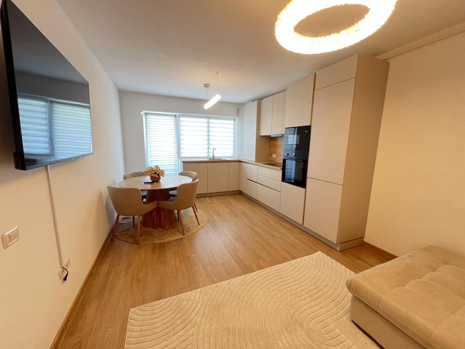 De închiriat-apartament-2 camere-open space-nou-mobilat-utilat-parcare