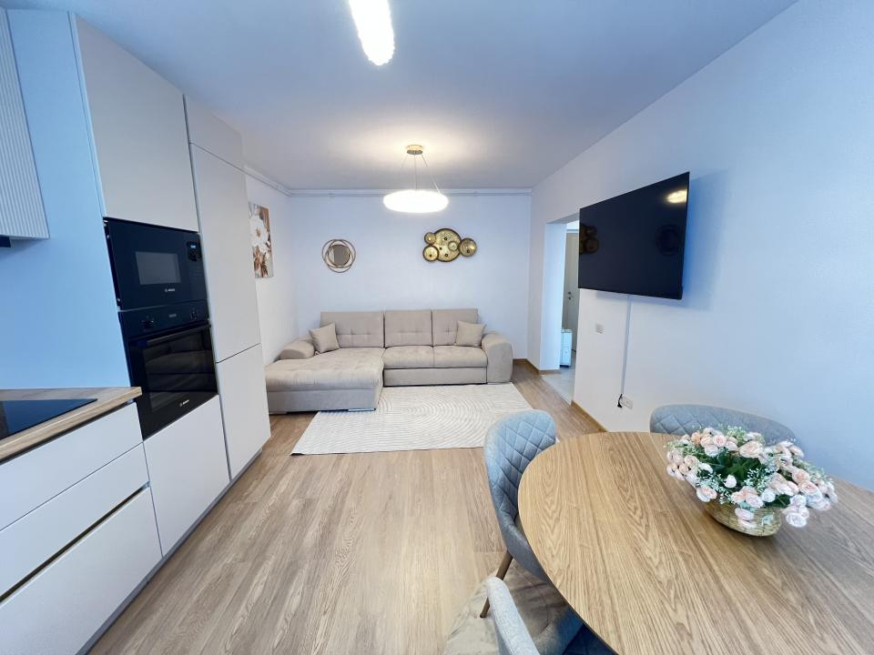 De închiriat-apartament-2 camere-open space-nou-mobilat-utilat-parcare