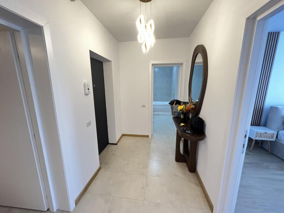 De închiriat-apartament-2 camere-open space-nou-mobilat-utilat-parcare