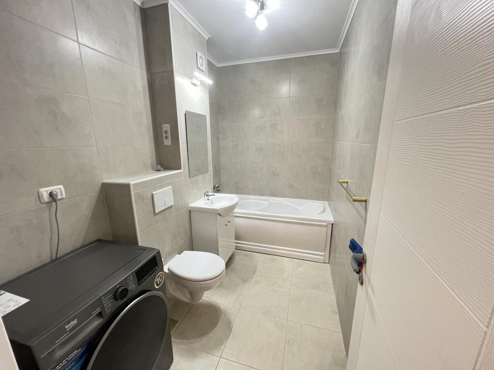 De închiriat-apartament-2 camere-open space-nou-mobilat-utilat-parcare