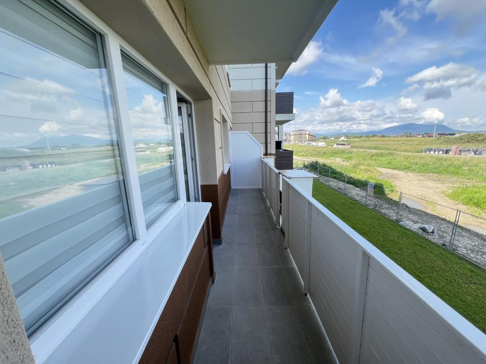 De închiriat-apartament-2 camere-open space-nou-mobilat-utilat-parcare