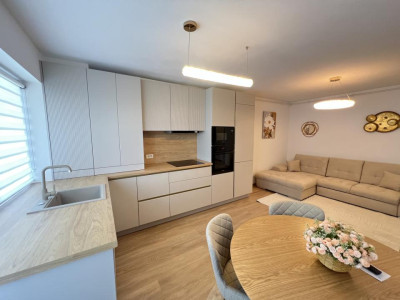 De închiriat-apartament-2 camere-open space-nou-mobilat-utilat-parcare