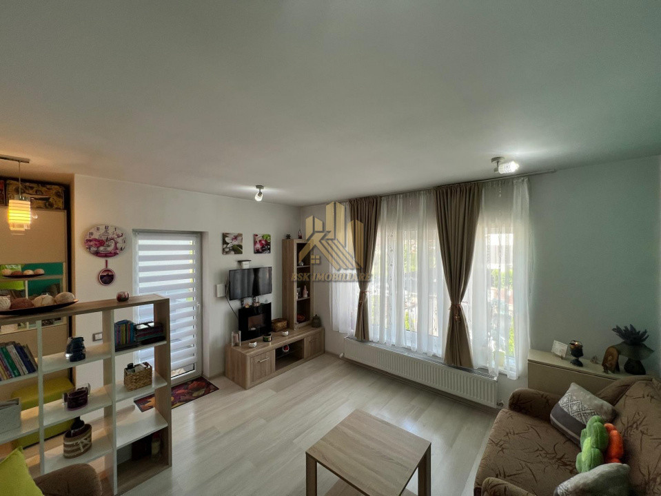 Apartament cu 2 camere, curte privată și pod generos